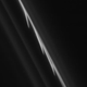 Image for article titled Glittering trails of giant snowballs seen in weirdest ring of Saturn